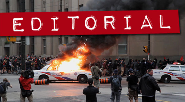 Thumbnail for Editorial stock footage collection showing burning police car at 2010 G20 summit in Toronto Canada